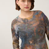 Broderick's Clothing Co. FDJ 3/4 sleeve top featuring a multi-colored abstract print on lightweight fabric