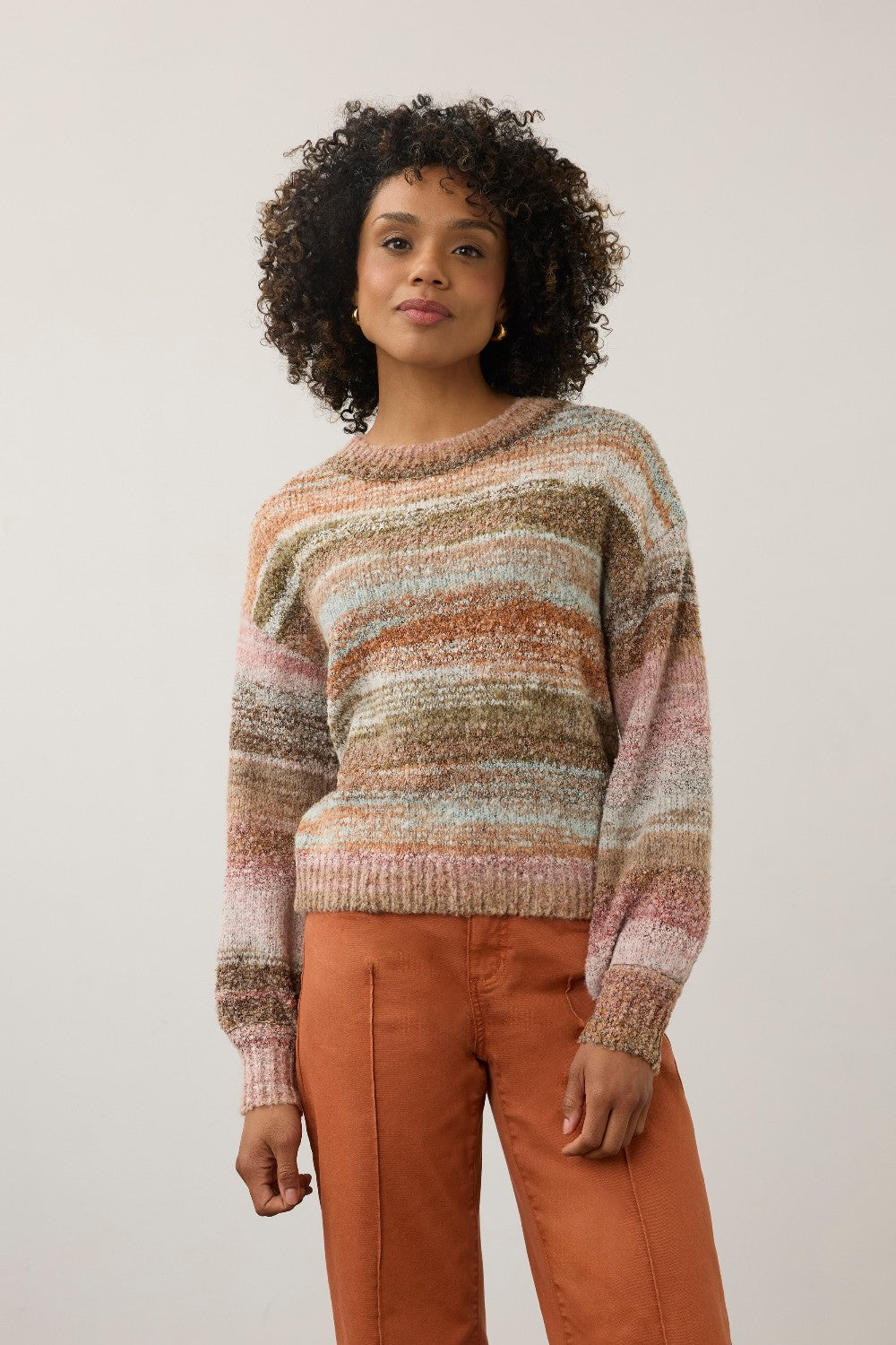 Model wearing a Broderick's Clothing Co. FDJ boat neck boucle sweater with a multi-coloured striped textured knit.