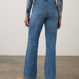 Broderick's Clothing Co. FDJ Olivia medium blue denim bootcut jeans with back panel detail and tan kitten heel boots.