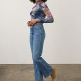 Broderick's Clothing Co. FDJ Olivia bootcut jeans in medium blue denim with knee panel detail worn with tan boots