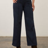 Broderick's Clothing Co. FDJ Olivia wide leg pants in dark navy cotton twill with pintuck detailing and brown boots
