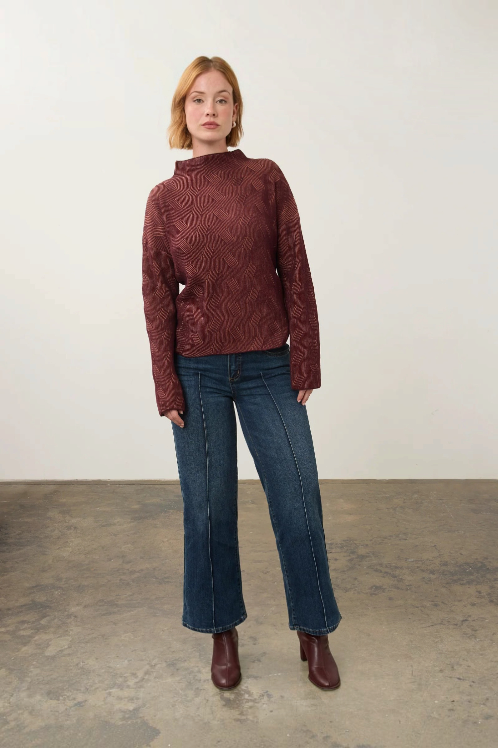 Broderick's Clothing Co. FDJ long sleeve funnel neck sweater in fig blush textured cotton knit on a female model