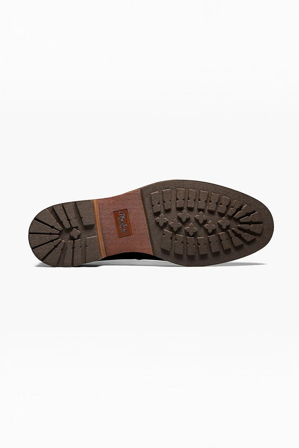 Broderick's Clothing Co. Florsheim Lodge boot showing the durable brown rubber lug sole with deep tread pattern