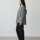 Broderick's Clothing Co. Shannon Passero Aubrey black and white gingham button-down shirt on a model in profile view.