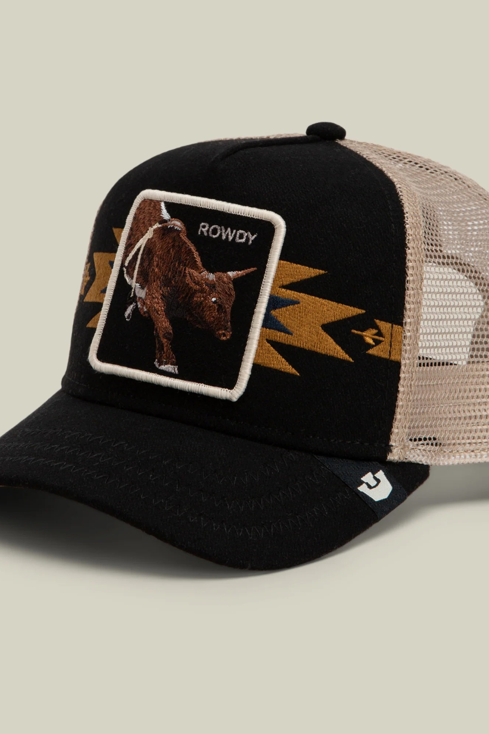 Broderick's Clothing Co. Goorin Bros. black trucker hat with a bull patch, desert-inspired embroidery, and tan mesh.