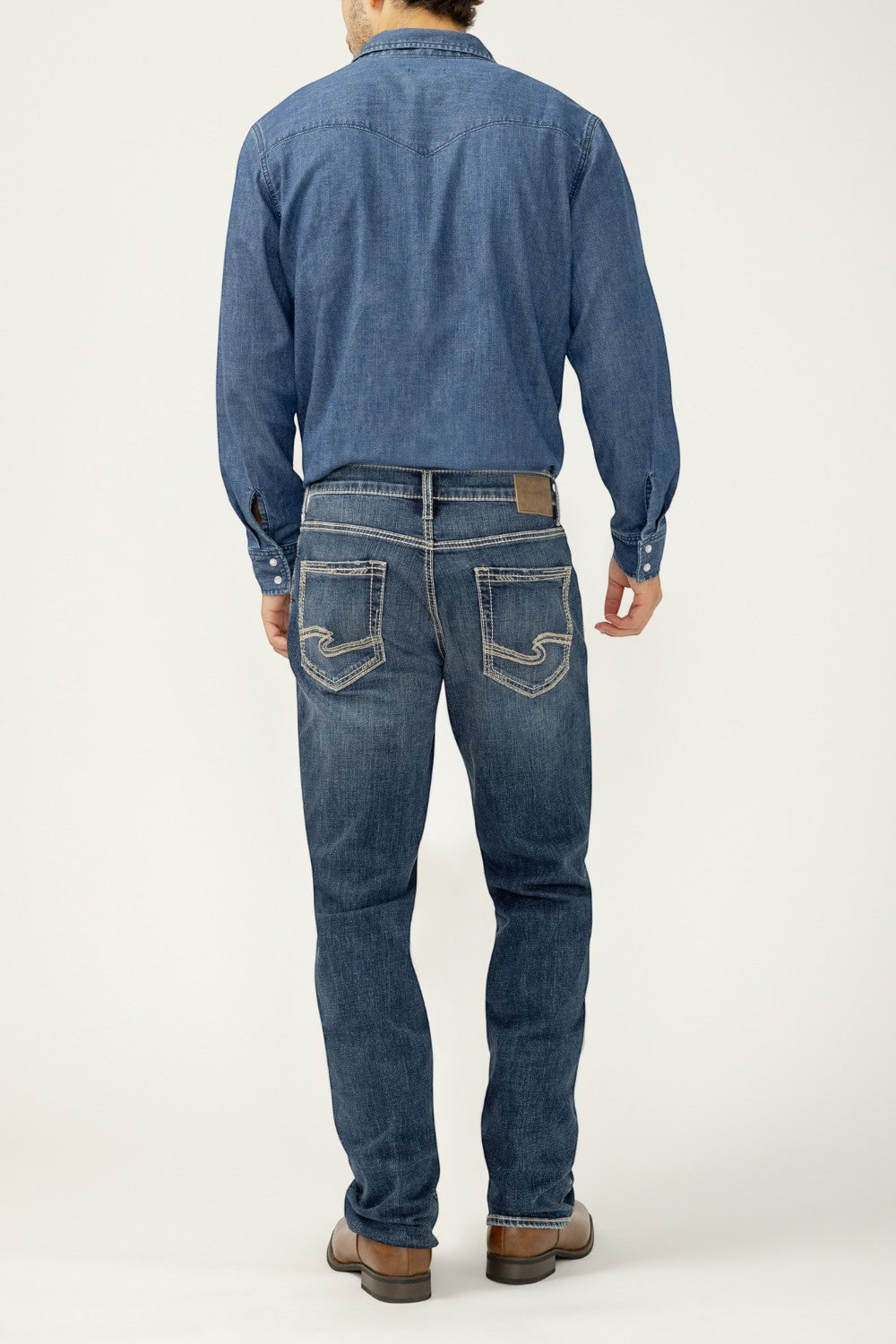 Broderick's Clothing Co. Silver Jeans Co. Grayson straight leg jeans in medium wash denim, back view on a man.