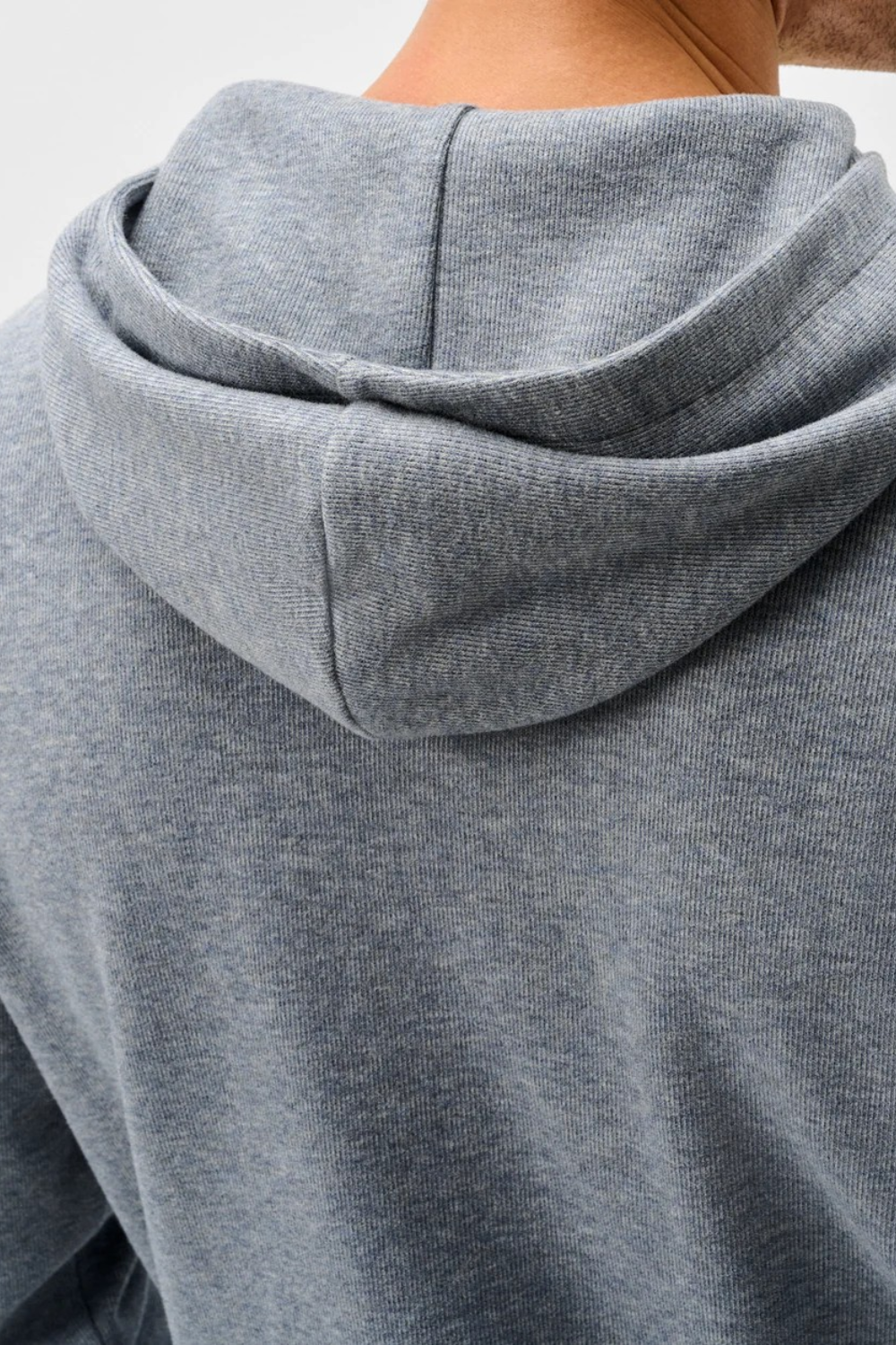 Broderick's Clothing Co. grey heathered cotton-blend hoodie showing the hood detail from behind