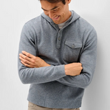 Broderick's Clothing Co. grey heathered button henley hoodie with a chest pocket worn by a smiling man
