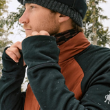 Broderick's Clothing Co. man wearing a grey ribbed Smartwool Second Cut cuffed beanie with ski goggles in the snow