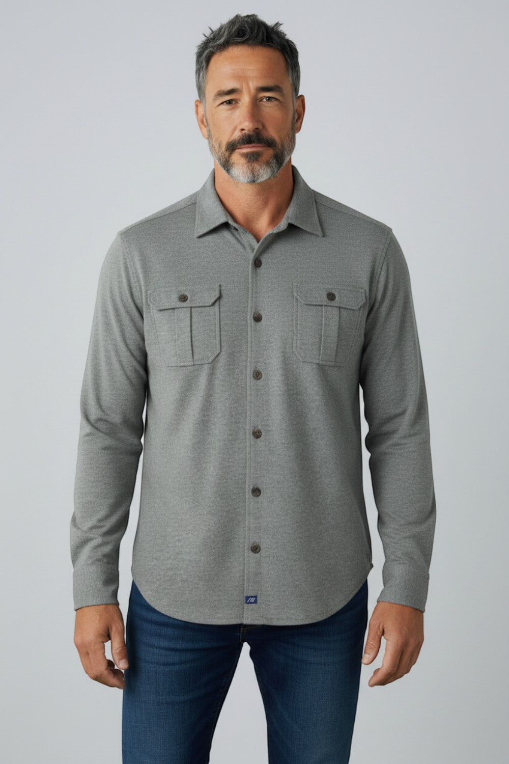 Broderick's Clothing Co. grey twill overshirt with dual chest pockets worn by a man against a light background