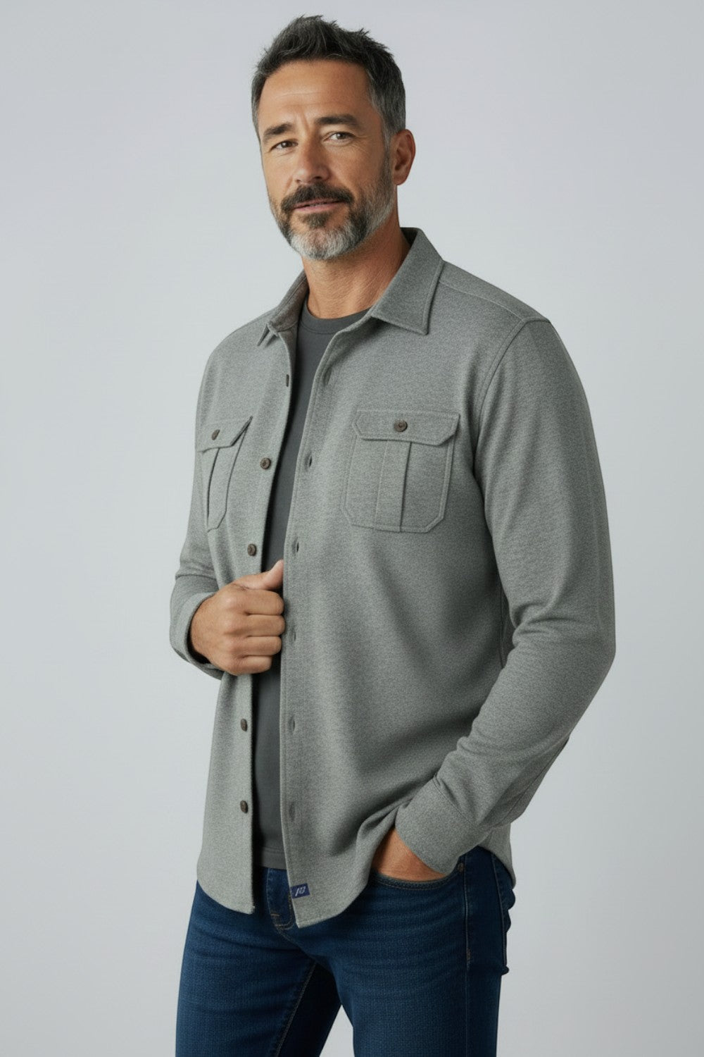 Broderick's Clothing Co. Johnnie-O grey twill overshirt with dual chest pockets worn by a man over a dark t-shirt.