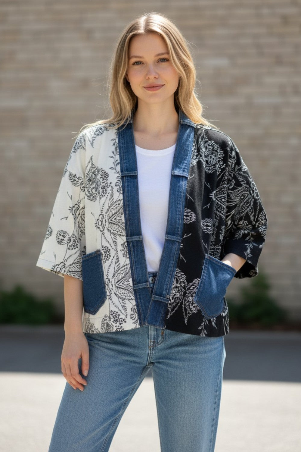 Broderick's Clothing Co. Shannon Passero Karol cardigan with split cream and black floral print and denim trim.