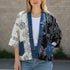 Broderick's Clothing Co. Shannon Passero Karol cardigan with split cream and black floral print and denim trim.