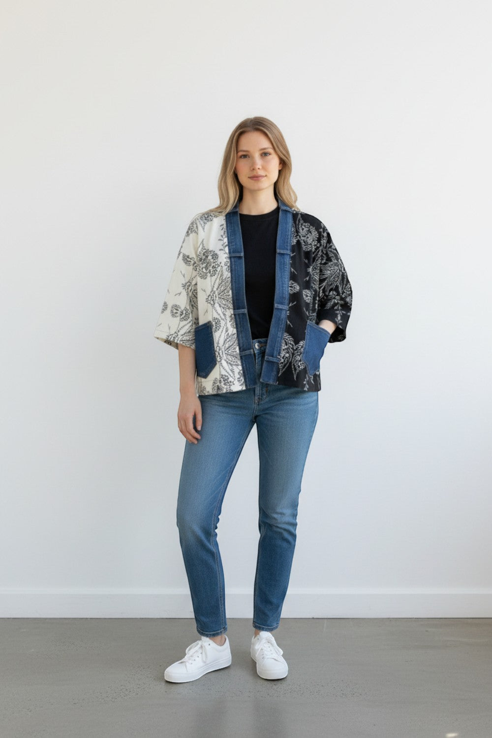 Broderick's Clothing Co. Shannon Passero Karol cardigan with cream and black floral panels and denim trim.