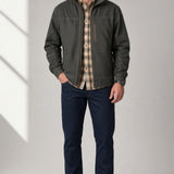 Broderick's Clothing Co. KÜHL BURR jacket in dark grey canvas with a zip front, worn by a male model.