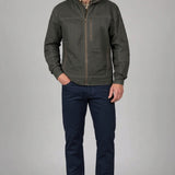 Broderick's Clothing Co. KÜHL BURR olive green canvas jacket with zip pockets worn by a man in dark jeans