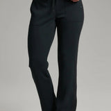 Broderick's Clothing Co. KÜHL Kozy black fleece-backed knit pants with a pull-on waistband and rib paneling details.