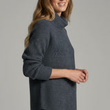 Broderick's Clothing Co. KÜHL Sienna charcoal grey chunky knit sweater with a ribbed cowl neck and curved hem
