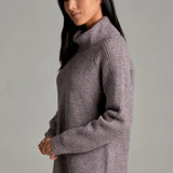 Broderick's Clothing Co. KÜHL Sienna sweater in heathered mauve with a ribbed cowl neck and curved hem on a model.