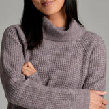 Broderick's Clothing Co. KÜHL Sienna sweater in heathered mauve with a ribbed cowl neck and raglan sleeves