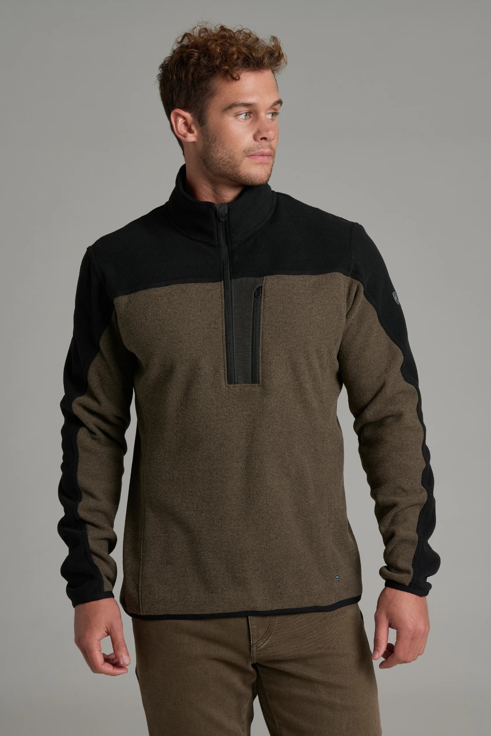 Broderick's Clothing Co. KÜHL SKORCHR fleece quarter-zip sweater in olive and black with a chest pocket.