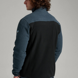 Broderick's Clothing Co. KÜHL SKORCHR fleece 1/4 zip sweater in blue and black, back view on a male model.