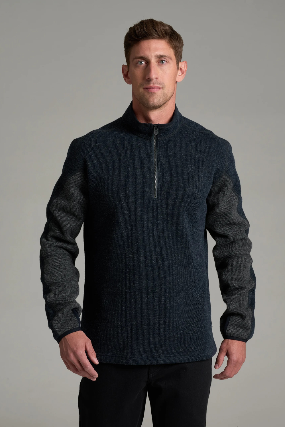 Broderick's Clothing Co. KÜHL Thor 1/4 zip sweater in dark navy wool blend with charcoal grey articulated sleeves.