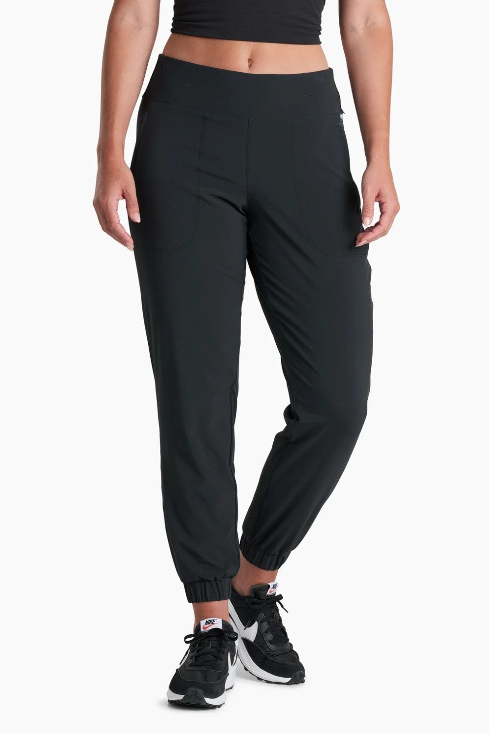 Broderick's Clothing Co. KÜHL Vantage black lined jogger pants with elastic waistband and cuffs on a model