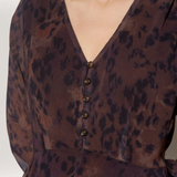 Broderick's Clothing Co. apricot leopard print chiffon midi dress with V-neck and button-down bodice detail
