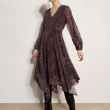 Broderick's Clothing Co. apricot and brown leopard print chiffon midi dress with hanky hem and blouson sleeves.