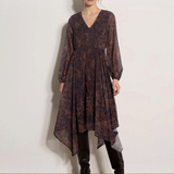 Broderick's Clothing Co. apricot leopard print chiffon midi dress with V-neck, blouson sleeves, and hanky hem.