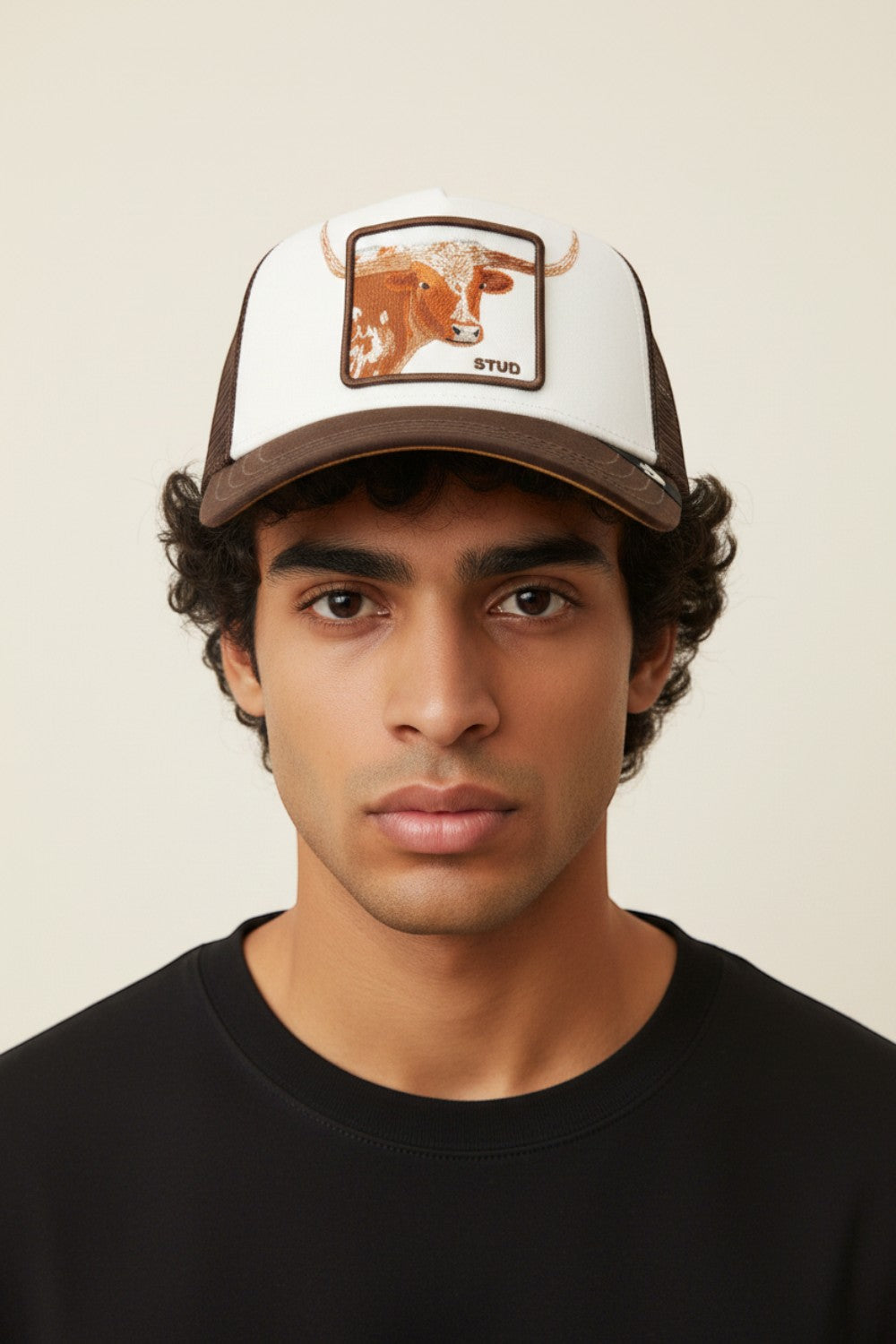 Broderick's Clothing Co. Goorin Bros. brown and white trucker hat with longhorn patch worn by a man
