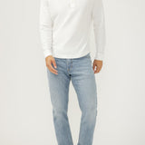 Broderick's Clothing Co. Silver Jeans Co. Machray light wash slim straight fit denim jeans worn by a male model