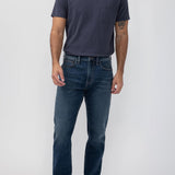 Broderick's Clothing Co. Silver Jeans Co. Machray straight leg jeans in medium wash denim worn by a male model