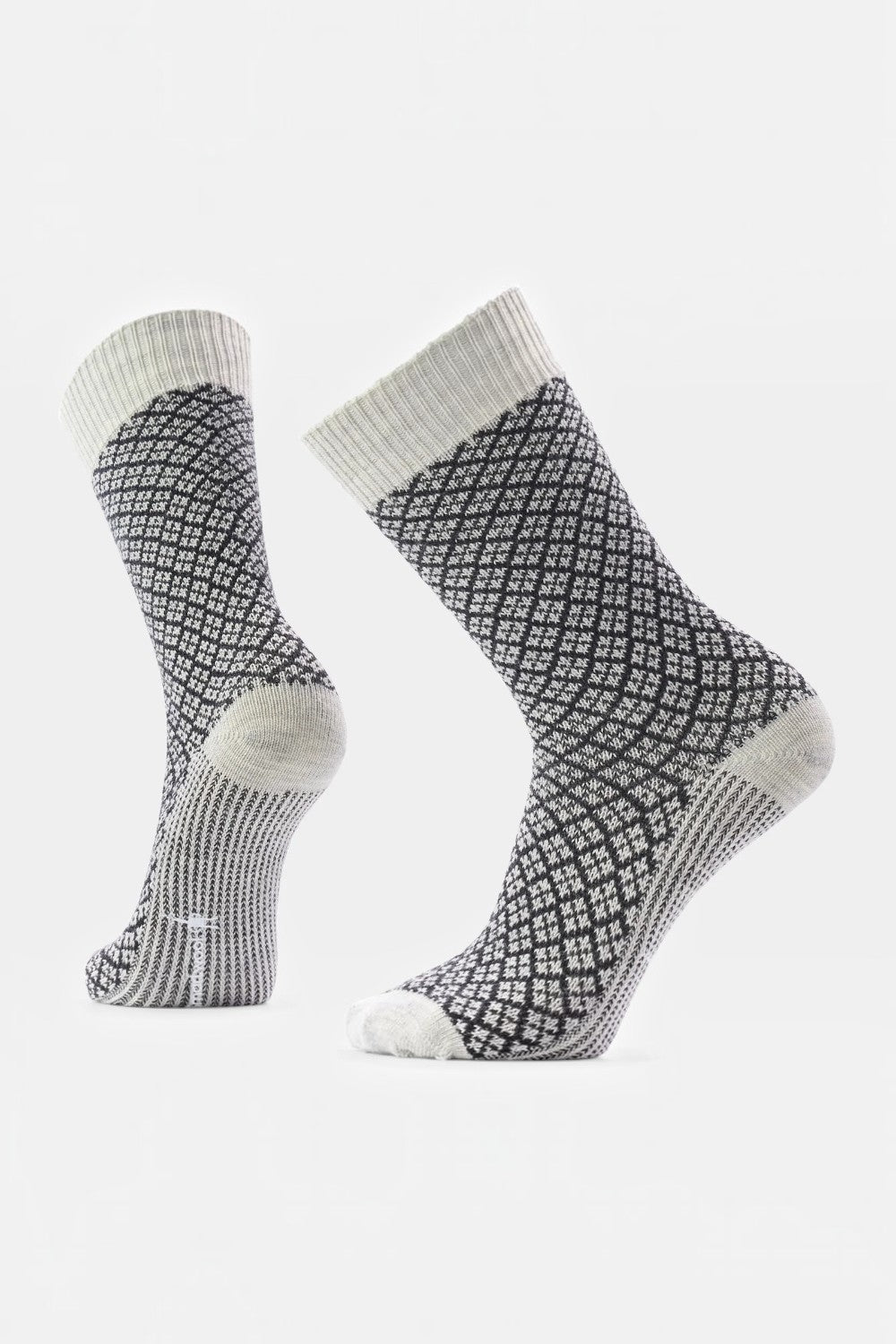 Broderick's Clothing Co. Smartwool crew socks featuring a black and white geometric pattern and chunky knit texture.