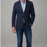 Broderick's Clothing Co. navy denim knit sport coat worn by a man with a light blue shirt and dark jeans