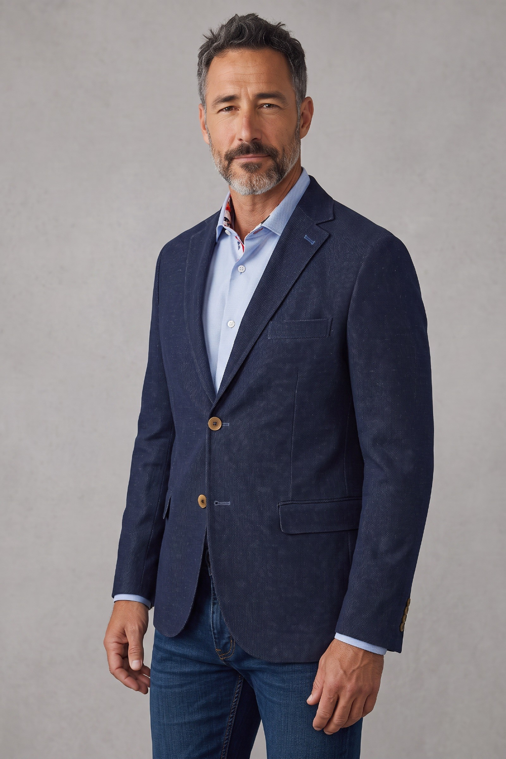 Broderick's Clothing Co. 7 Downie St. navy denim knit sport coat worn by a man with a light blue shirt