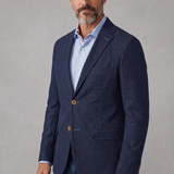 Broderick's Clothing Co. 7 Downie St. navy denim knit sport coat worn by a man with a light blue shirt