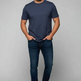 Broderick's Clothing Co. Au Noir C-MAVEN navy blue crew neck t-shirt in mercerized cotton blend worn by a man