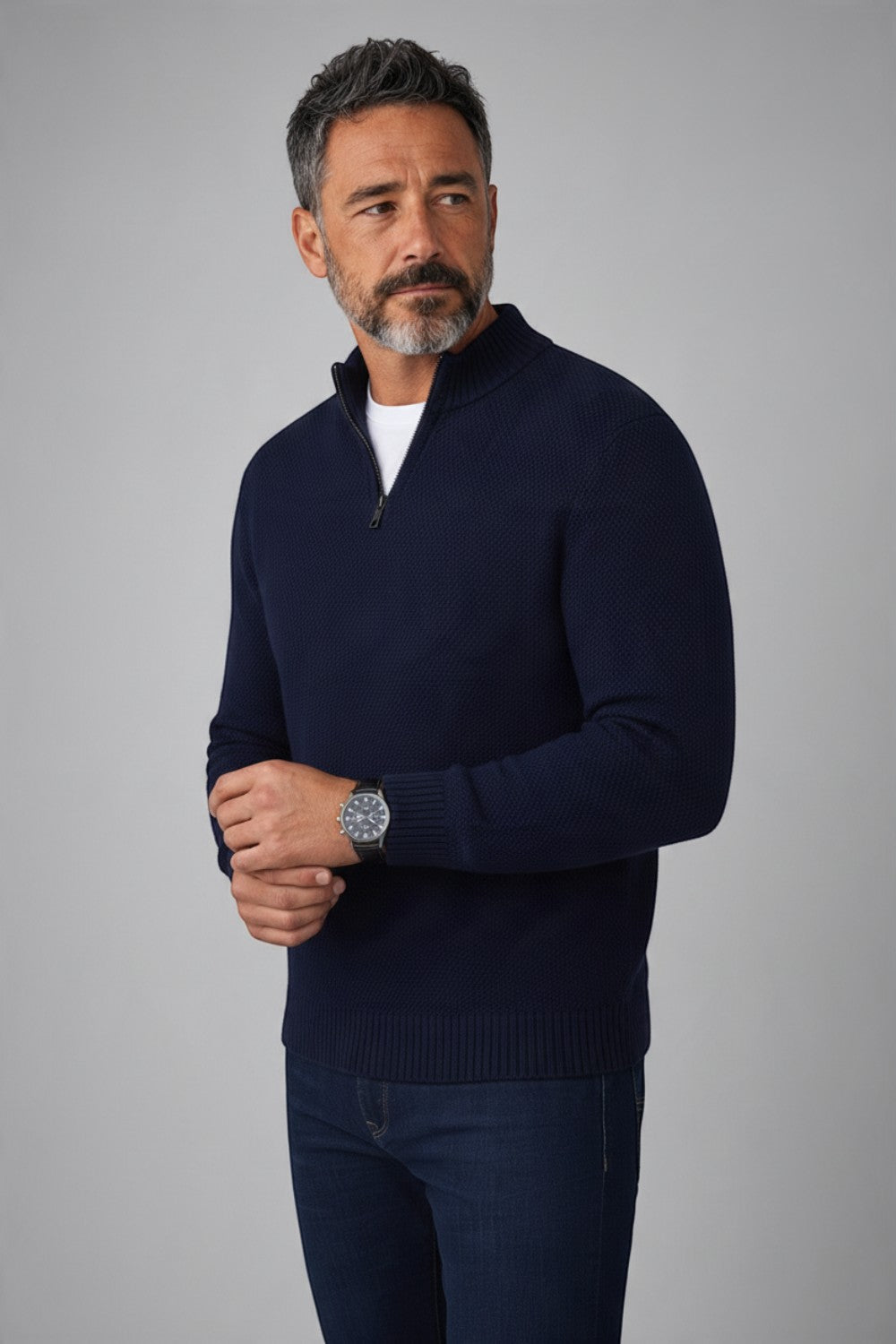 Broderick's Clothing Co. navy blue merino wool blend quarter zip sweater with stand-up collar worn by a male model.