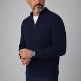 Broderick's Clothing Co. navy blue merino wool blend quarter zip sweater with stand-up collar worn by a male model.