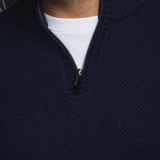 Broderick's Clothing Co. navy blue merino wool blend quarter zip sweater with a metal zipper and rib-knit collar
