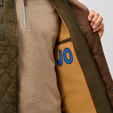 Broderick's Clothing Co. Johnnie-O olive diamond-quilted snap jacket with interior pocket and orange trim details