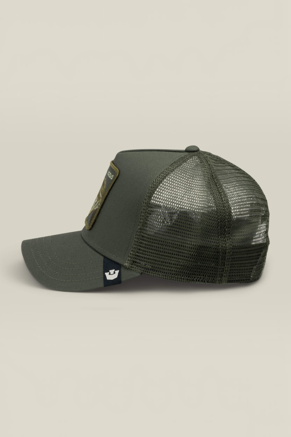 Broderick's Clothing Co. olive green Goorin Bros. Vicious trucker hat with mesh back and snake patch side profile