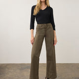 Broderick's Clothing Co. FDJ Olivia wide leg pants in olive green euro twill with pintuck detailing on a model.