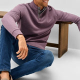 Broderick's Clothing Co. purple diamond-knit henley pullover with suede placket details worn by a smiling man.