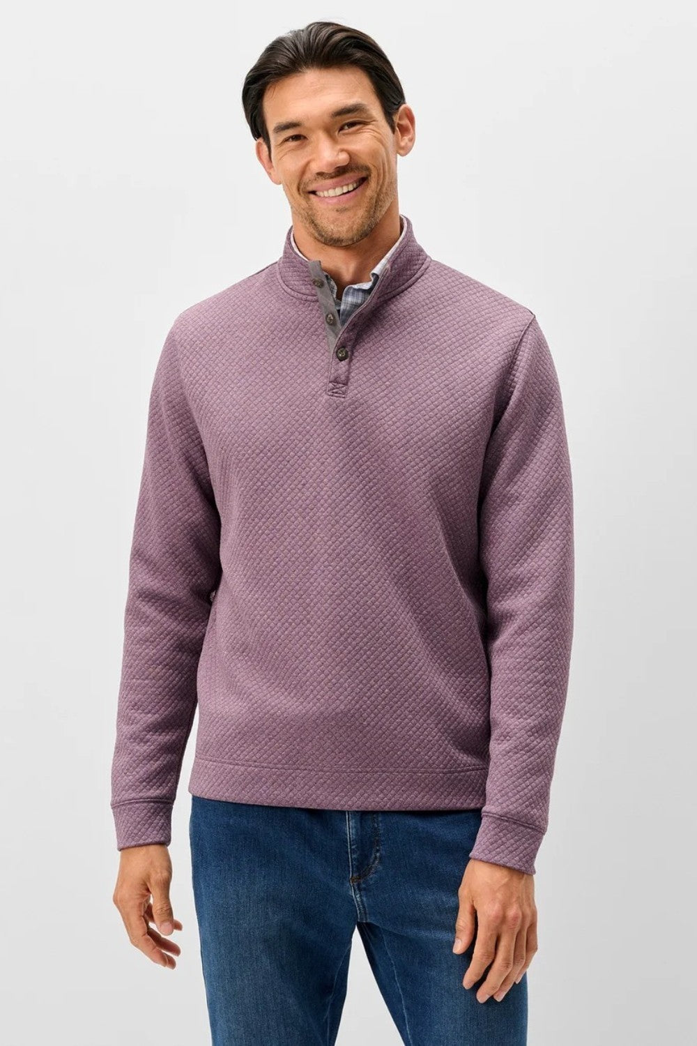Broderick's Clothing Co. Johnnie-O purple diamond quilted henley pullover with suede placket details on a male model.