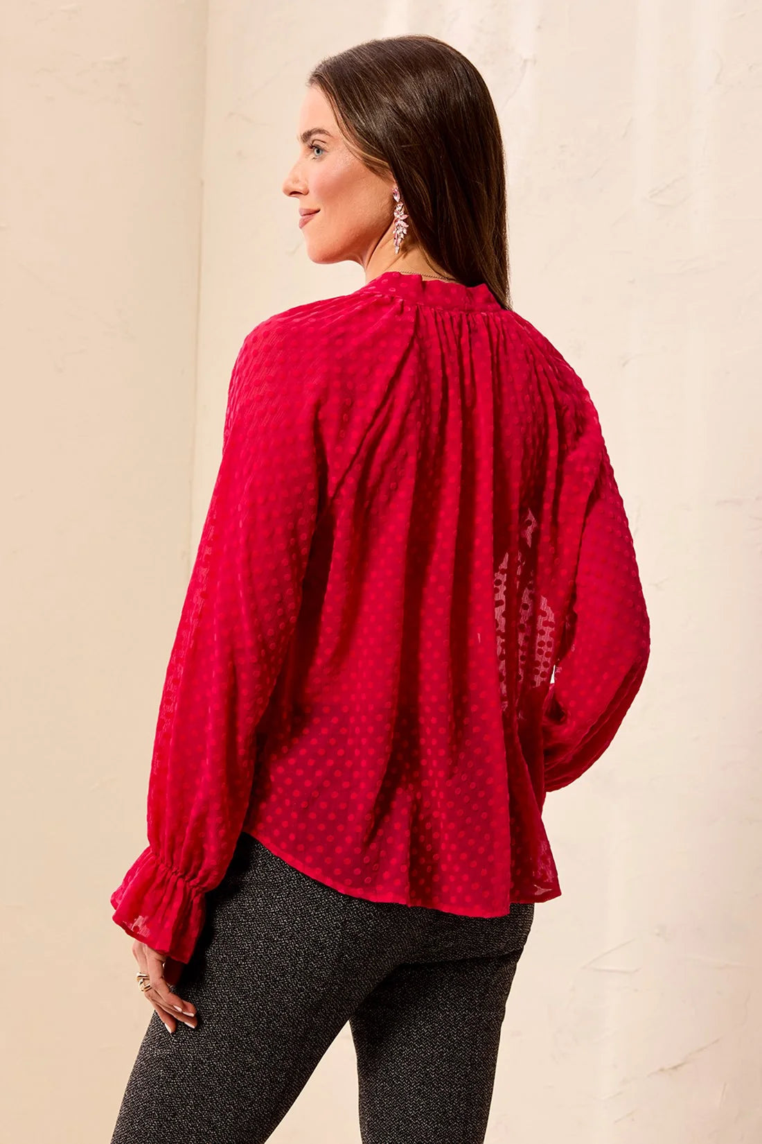 Broderick's Clothing Co. red sheer crinkle chiffon blouse with polka dot texture, long sleeves, and ruffled cuffs.