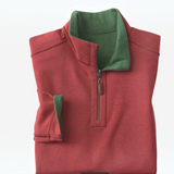 Broderick's Clothing Co. reversible quarter zip in red and green with a stand collar and leather-look zipper pull.