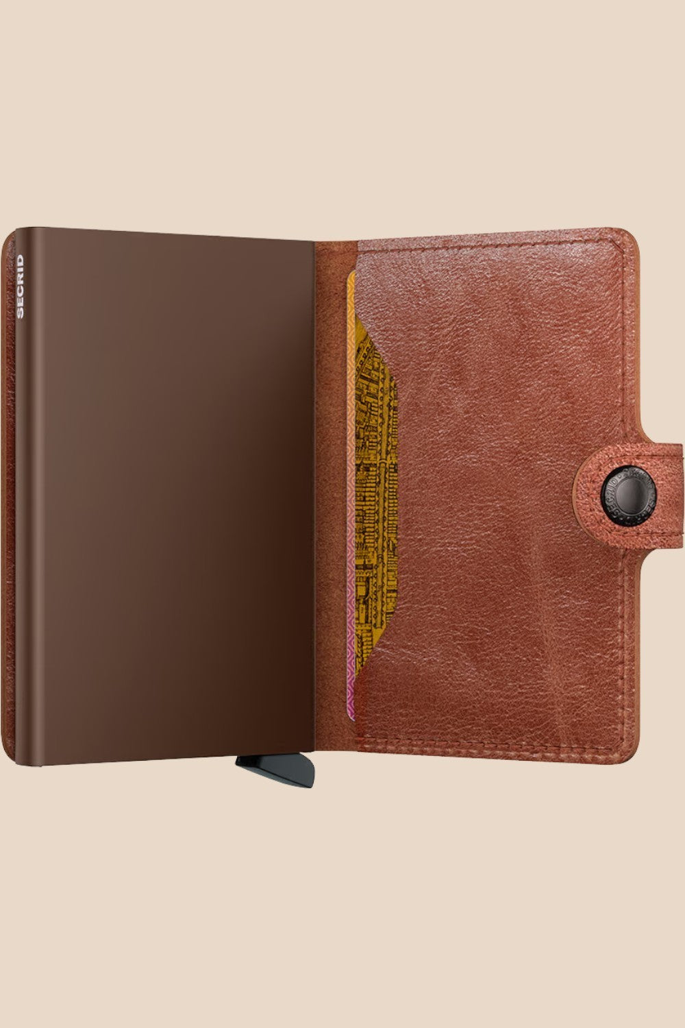 Broderick's Clothing Co. Secrid Miniwallet in vintage cognac-brown leather with an integrated aluminium card protector.